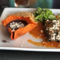 Enchiladas Huastecas · Three blue corn cheese enchiladas topped with Huasteca red sauce and queso fresco. Served wi...