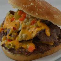 Al Capone Burger · Home made burger top with Italian Beef Meat Nacho cheese and Hot or Mild peppers, Only if yo...