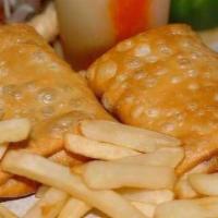 Beef Pizza Puff With Fries · Pure beef pizza puff served with fries .