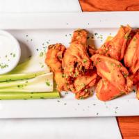 Wings · One pound of jumbo chicken wings tossed in hot, mild, bbq, chili lime or honey old bay sauces.