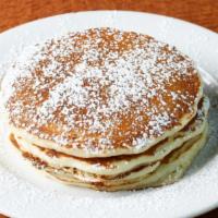 Buttermilk Pancakes · An eggspectation favorite: four of our signature fluffy pancakes. Simply delectable.

These ...