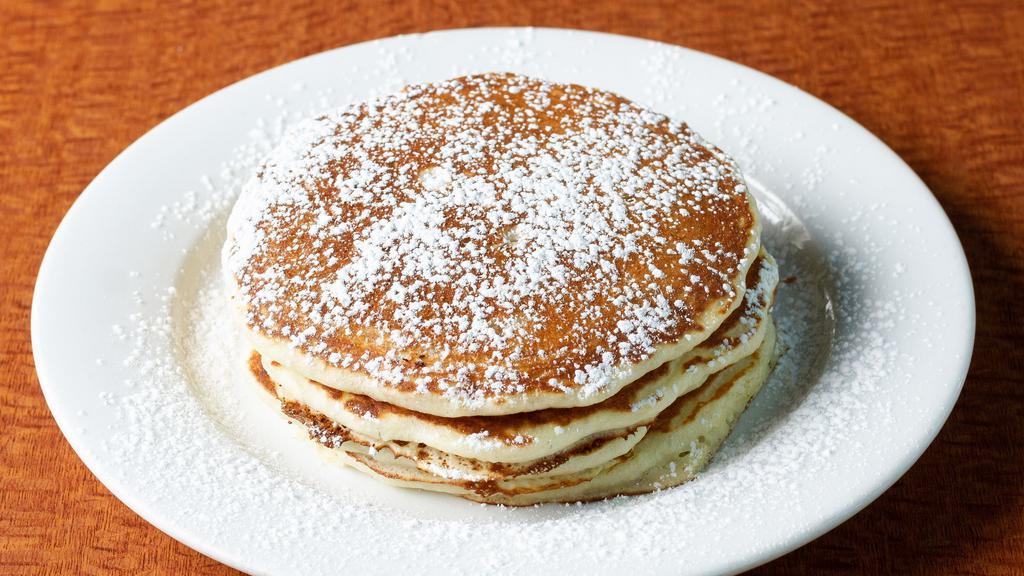 Buttermilk Pancakes · An eggspectation favorite: four of our signature fluffy pancakes. Simply delectable.

These items can be cooked to order Consuming raw or undercooked meats, poultry, seafood, pork, or eggs may increase your risk of foodborne illness, especially if you have certain medical conditions.