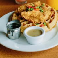 Chicken & Waffles · Our take on this classic.  Pan fried chicken strips piled high on a homemade Belgian waffle,...