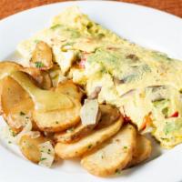 Veggie Omelette · This omelette appeals to everyone with sautéed mushrooms, red and green peppers, broccoli, c...