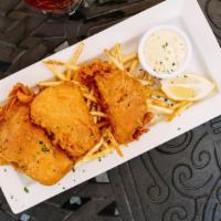 Fish ‘N’ Chips · Fresh haddock dipped in our homemade beer batter and fried to a golden brown. Served with Fr...