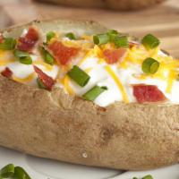Livermore Spud · Bacon | Cheese | green onions | 
* Comes with  side of sour cream & butter