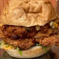 Chili Bird · Lisa Fuego chili, shredded lettuce, SAF aioli, Cheez sauce, fried chicken