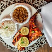 Half Grilled Chicken · Served with chickpeas, rice, 1 naan, & salad.