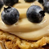 Blueberry Dream · Fresh Blueberry Coffee Cake topped with cream cheese frosting and fresh blueberries made ent...