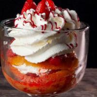 Strawberry Shortcake · Delicious yellow cake layered with strawberries and real whipped cream. Served by the slice ...