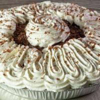 Chocolate Cream Pie · Homemade chocolate pudding in a rich golden crust and topped with real whipped cream.