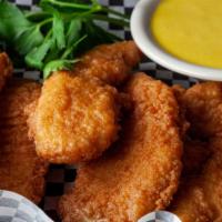 Chicken Fingers · Chicken Tenders cooked golden brown with your choice of dipping sauce