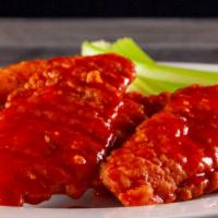 Buffalo Chicken Fingers · Spicy. Crispy on the outside, tender chicken inside! Tossed in our spicy buffalo sauce and s...