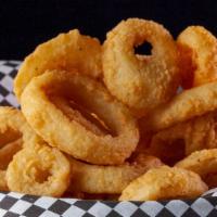 Flour Flipped Onion Rings · A bucket of our homestyle, flour flipped onion rings cooked until golden brown and seasoned ...