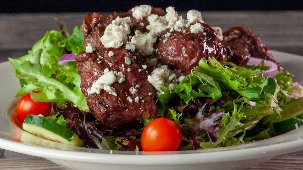 Steak Tip Salad · Juicy grilled steak tips served over fresh mixed greens with red onion, cucumbers, crumbled gorgonzola cheese, and grape tomatoes. Served with your choice of dressing.
This item is raw or partially cooked and can increase your risk of foodborne illness. Consumers who are especially vulnerable to foodborne illness should only eat seafood and other food from animals thoroughly cooked. Please inform your server if a person in your party has any food allergies.