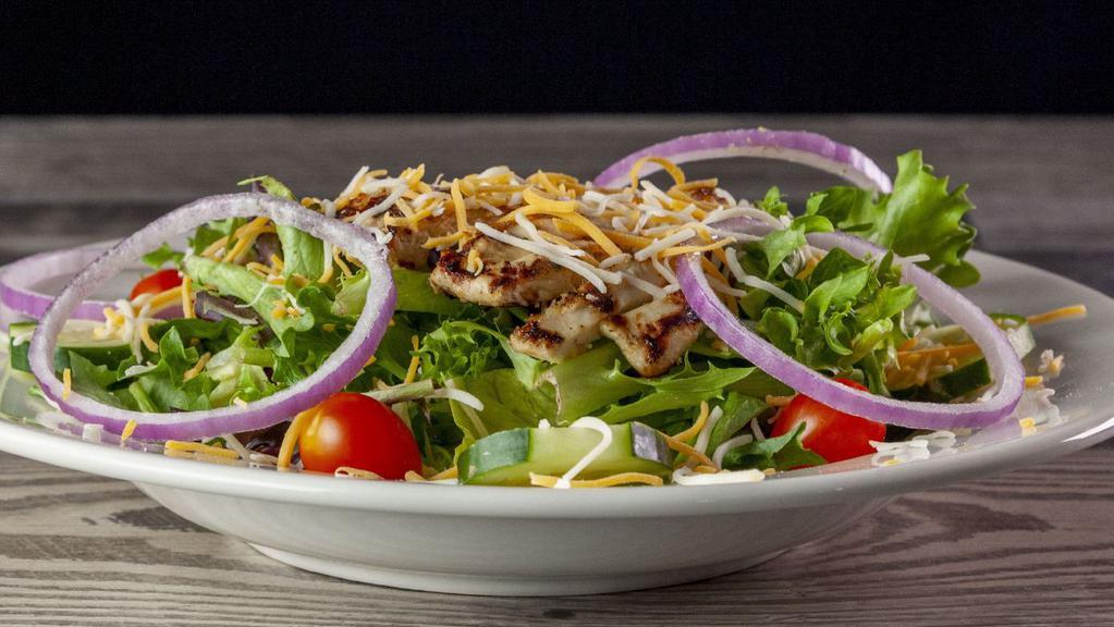 Fresh Grilled Chicken Salad · Fresh mixed greens with red onions, cucumbers, grape tomatoes, and shredded cheddar and Monterey jack cheeses. Topped with grilled chicken and your choice of dressing.