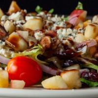 Chelo'S Orchard Salad · Fresh garden salad with sliced red onions, grape tomatoes, candied walnuts, apples, dried cr...