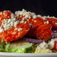 Buffalo Chicken Salad · Spicy. Our classic garden salad with bleu cheese dressing fired up with buffalo tenders and ...