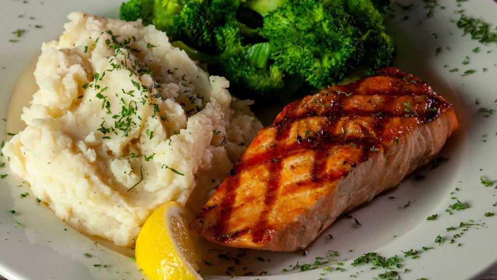 Grilled Norwegian Salmon · Grilled Norwegian salmon with our own secret seasoning. Served with your choice of two sides.