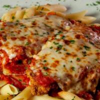 Chelo'S Chicken Parmesan · Breaded chicken breasts topped with chelo's own marinara sauce and mozzarella cheese. Served...