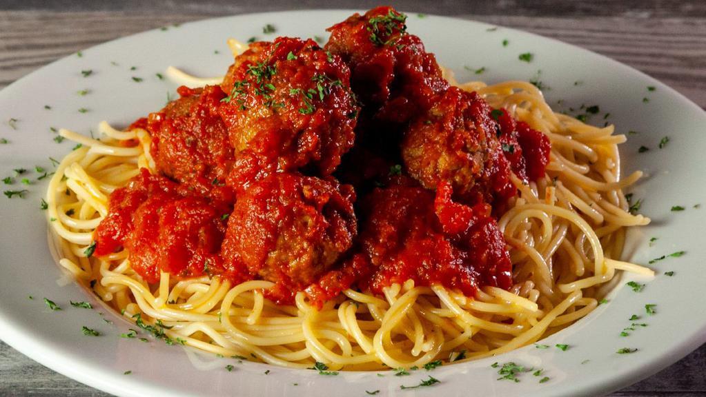 Spaghetti & Meatballs · A generous portion of our famous meatballs served over your choice of penne or spaghetti and topped with chelo's own marinara sauce. Served with a side of your choice.