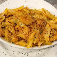 Vegan Buffalo Chk'N Mac & Cheese · Our homemade creamy Daiya Cheese sauce tossed with meatless breaded chicken and Frank's Buff...