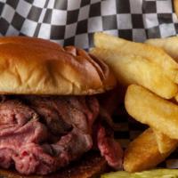 Giant Roast Beef Sandwich · 1/2 lb. of Chelo's famous roast beef sliced thin and piled high on a grilled bulkie roll.
Th...