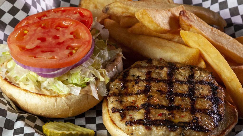 Turkey Burger · Grilled fresh ground turkey seasoned with garlic pepper. Served on a grilled bulkie roll with lettuce, tomato, and onion. Topped with our special bistro sauce.