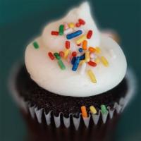 Chocolate Loves Vanilla · Chocolate cake topped with vanilla buttercream & rainbow sprinkles.
