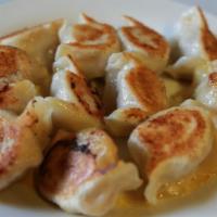 Pan Fried Chives Dumplings · 4 pieces.