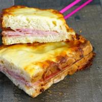 Ham Croque Monsieur · Slices of white bread with ham and melted cheese. Contains: wheat, milk.