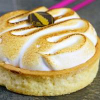 Lemon Meringue Tart · Crusty pie crust filled with lemon cream and covered with a soft meringue. 
Contains: Wheat,...