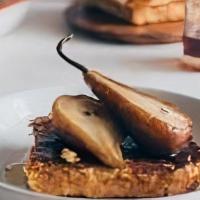 Pear & Nutella French Toast · Classic French toast topped with caramelized pears and Nutella. Served with syrup and butter.
