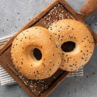 Flavored Cream Cheese On Bagel · Delicious warm crispy bagel with your choice of flavored cream cheese.
