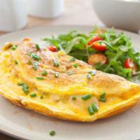 Cheese Omelette · Fresh three eggs and cheese, served with a bagel with butter.