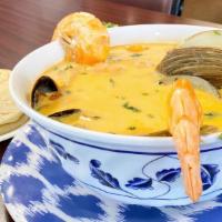 Sopa Mariscos · Seafood soup, served with rice and two tortillas.