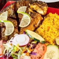 Pescado Frito · Whole fried fish, served with rice and salad.