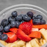 Fruit Freak · Acai Bowl topped with Gluten-Free Granola, Blueberries, Strawberries, Banana & Honey.