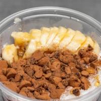 Kakao · Acai bowl topped with Gluten Free Granola, Cacao Nibs, Honey, Banana and Shredded Coconut