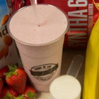 Strawberry Slam · 24 oz. of strawberry protein, almond milk, strawberry puree, banana, and strawberries.