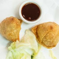 Vegetable Samosa · Crispily fried turnover, filled with potatos and peas.