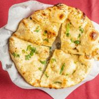 Garlic Naan · A delightful bread with garlic and spices.