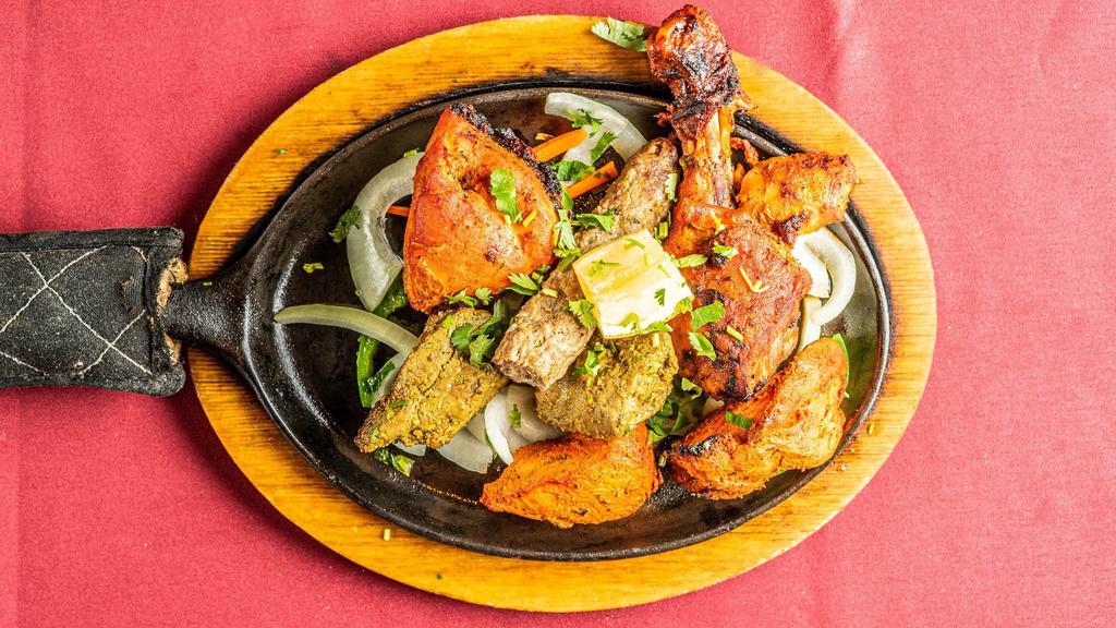 Tandoori Mixed Grill · A delicious combination of chicken and lamb.
