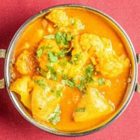 Aloo Gobhi · Fresh cauliflower and potatoes cooked with ginger, garlic, onion, and spices.
