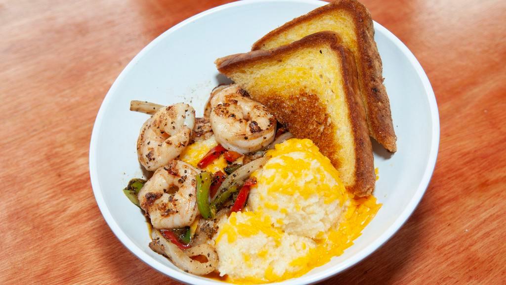 Diablo Shrimp N Grits · 6 blackened shrimp w/ red and green bell peppers and onions on top of a bowl of cheesy cheddar grits w/ butter and choice toast