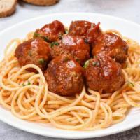 Spaghetti With Marinara Sauce And Meatballs · Bed of spaghetti topped with marinara sauce and meatballs.