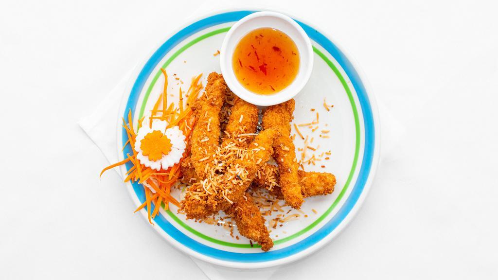 Coconut Chicken Finger · Tender sliced white chicken meat dipped in homemade coconut batter, coated with panko breadcrumb and fried until golden brown. Served with plum sauce.