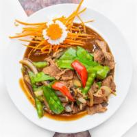 Mongolian · Your choice of protein stir fried with onions, bell peppers, mushroom and snow peas in tasty...