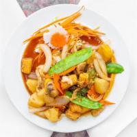 Rainbow Paradise · Your choice of protein stir fried with sliced mangoes, pineapple chunks, onions, snow peas, ...