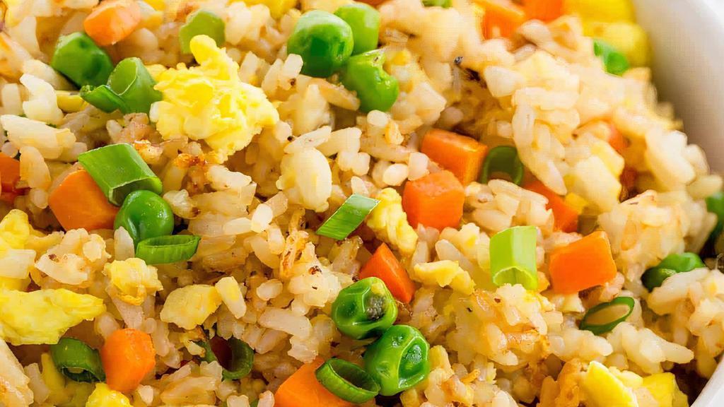 Veggie Fried Rice- White Jasmine · White jasmine rice stir fried with eggs, fried tofu, cabbage, carrots, snow peas, broccoli, mushroom and onions. Your Choice of with egg or no egg.